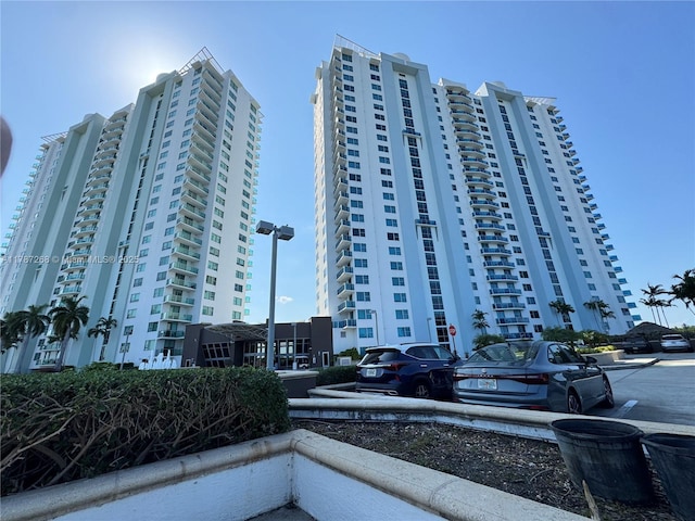 2681 N Flamingo Rd Unit Th4S, Sunrise, FL 33323 - view of building exterior with uncovered parking