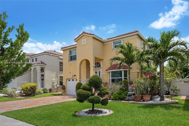 621 NW 157th Ave, Pembroke Pines, FL 33028 - mediterranean / spanish-style house featuring a garage, driveway, stucco siding, and a tiled roof