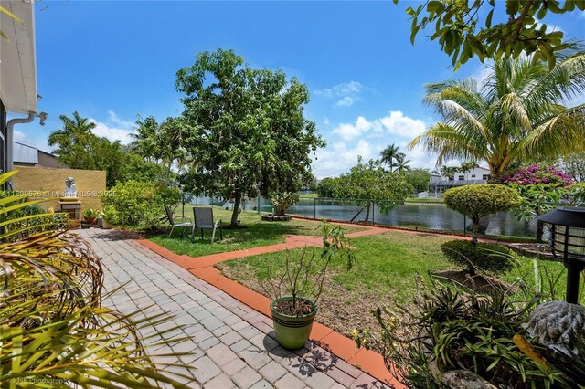 621 NW 157th Ave, Pembroke Pines, FL 33028 - view of property's community featuring a water view and a patio area