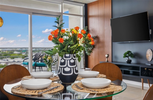 3250 NE 1st Ave Unit 806, Miami, FL 33137 - tiled dining area with plenty of natural light