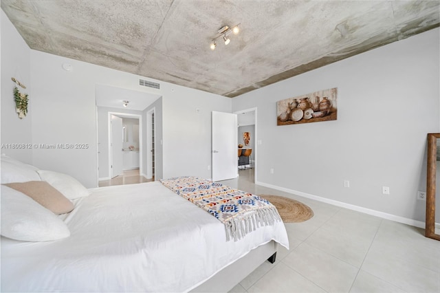 3250 NE 1st Ave Unit 806, Miami, FL 33137 - tiled bedroom with baseboards