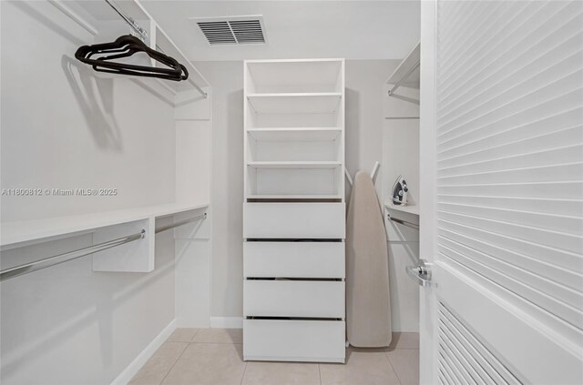 3250 NE 1st Ave Unit 806, Miami, FL 33137 - spacious closet with light tile patterned floors