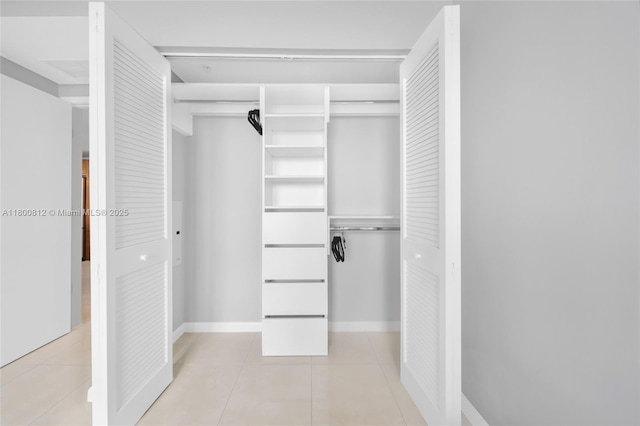 3250 NE 1st Ave Unit 806, Miami, FL 33137 - walk in closet featuring light tile patterned floors