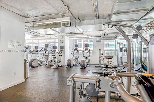 3250 NE 1st Ave Unit 806, Miami, FL 33137 - exercise room with baseboards