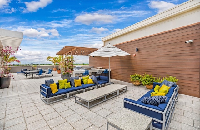 3250 NE 1st Ave Unit 806, Miami, FL 33137 - view of patio with outdoor lounge area, outdoor dining space, and exterior kitchen
