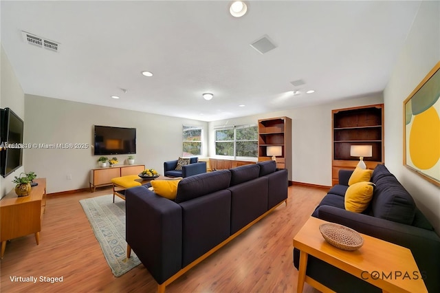 13781 NW 16th St, Pembroke Pines, FL 33028 - living room with light wood-style floors, baseboards, and recessed lighting