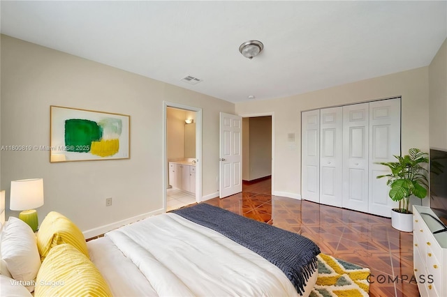 13781 NW 16th St, Pembroke Pines, FL 33028 - bedroom with baseboards, a closet, and ensuite bathroom