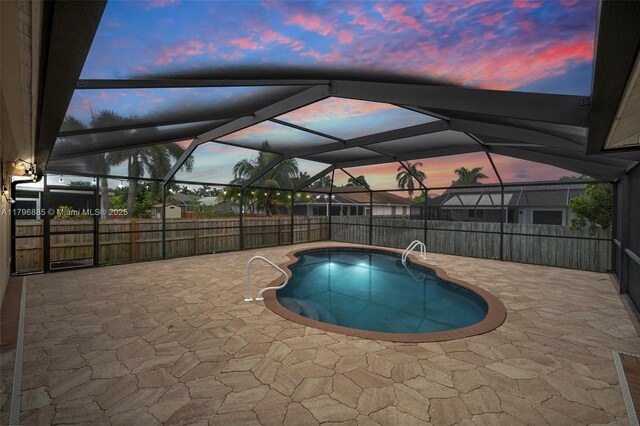 4344 Agualinda Blvd, Cape Coral, FL 33914 - view of swimming pool with a patio and glass enclosure