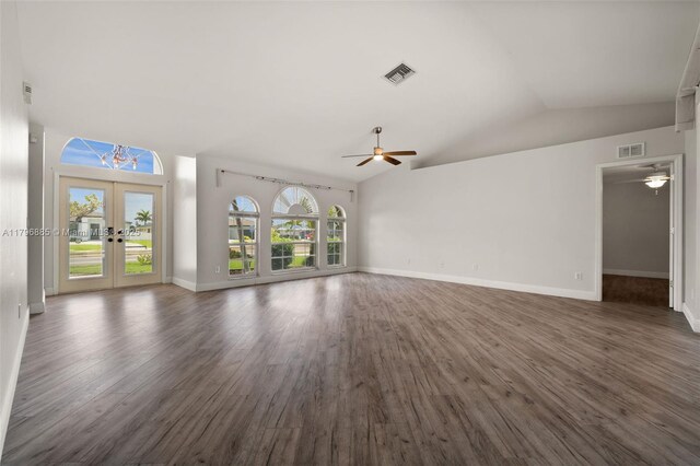 4344 Agualinda Blvd, Cape Coral, FL 33914 - unfurnished living room featuring a ceiling fan, french doors, lofted ceiling, wood finished floors, and baseboards