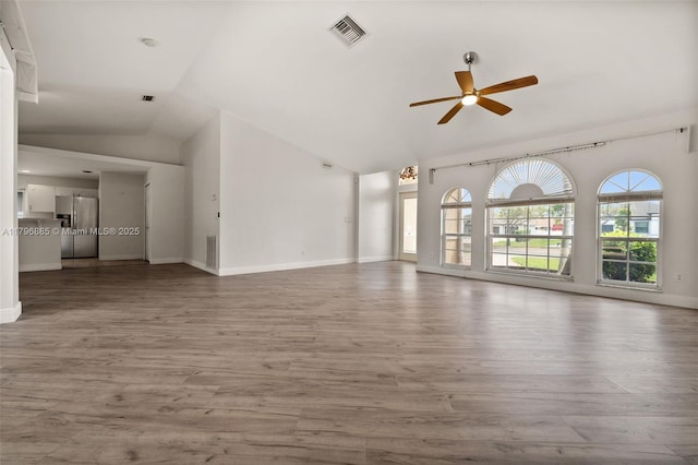 4344 Agualinda Blvd, Cape Coral, FL 33914 - unfurnished living room with lofted ceiling, ceiling fan, wood finished floors, and baseboards