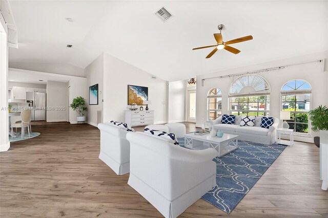 4344 Agualinda Blvd, Cape Coral, FL 33914 - living area with lofted ceiling, a ceiling fan, light wood-type flooring, and baseboards