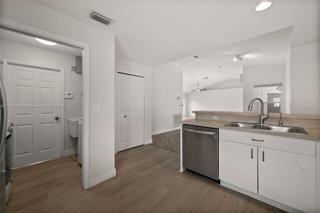 4344 Agualinda Blvd, Cape Coral, FL 33914 - kitchen featuring dishwasher, a sink, white cabinetry, wood finished floors, and lofted ceiling