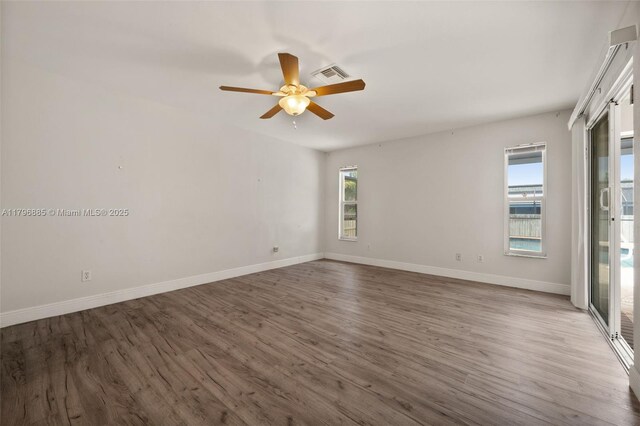 4344 Agualinda Blvd, Cape Coral, FL 33914 - empty room with wood finished floors, ceiling fan, and baseboards
