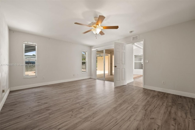 4344 Agualinda Blvd, Cape Coral, FL 33914 - unfurnished room featuring ceiling fan, wood finished floors, and baseboards