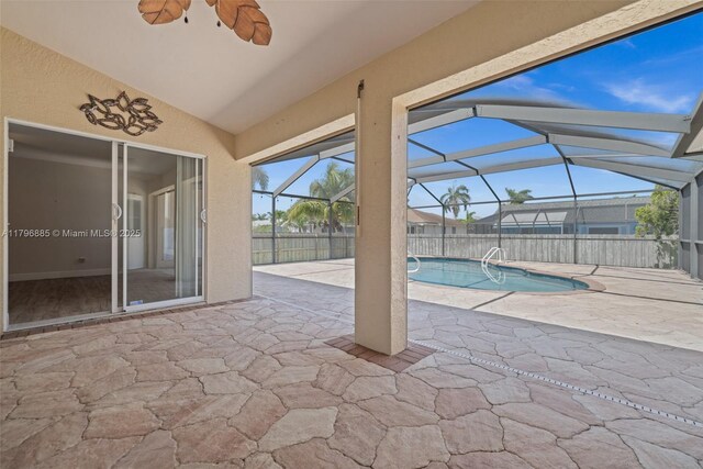 4344 Agualinda Blvd, Cape Coral, FL 33914 - view of patio / terrace with a ceiling fan and glass enclosure