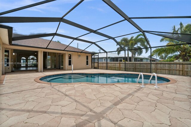 4344 Agualinda Blvd, Cape Coral, FL 33914 - view of swimming pool featuring a patio area and a lanai
