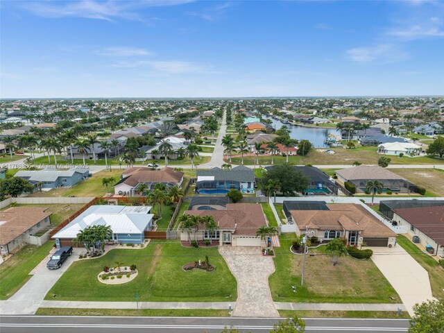 4344 Agualinda Blvd, Cape Coral, FL 33914 - aerial perspective of suburban area with a nearby body of water