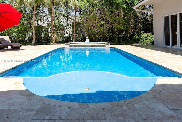 218 Egret Ct, Weston, FL 33327 - outdoor pool with an in-ground hot tub and a patio