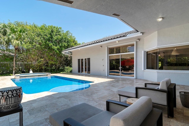 218 Egret Ct, Weston, FL 33327 - view of pool featuring a patio area and a pool with connected hot tub