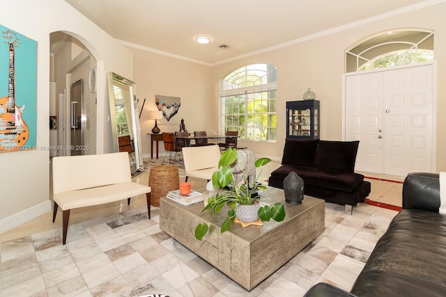 218 Egret Ct, Weston, FL 33327 - living area featuring crown molding, baseboards, and arched walkways