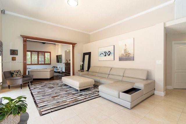 218 Egret Ct, Weston, FL 33327 - living room featuring crown molding, light tile patterned flooring, and baseboards