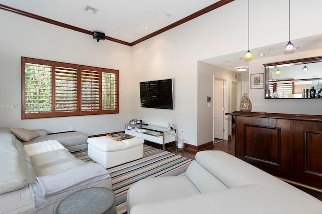 218 Egret Ct, Weston, FL 33327 - living area with crown molding, wood finished floors, and baseboards