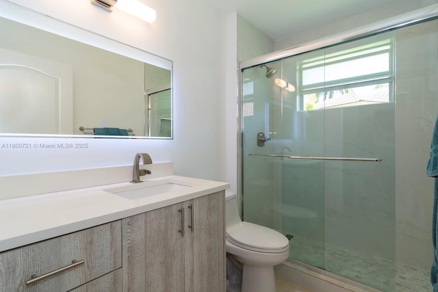 218 Egret Ct, Weston, FL 33327 - bathroom with toilet, a shower stall, and vanity