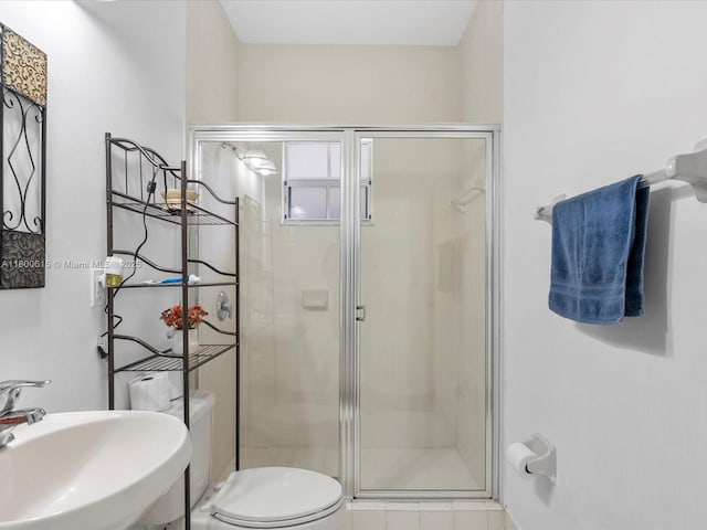 17616 SW 135th Ave, Miami, FL 33177 - bathroom with a sink, a shower stall, and toilet