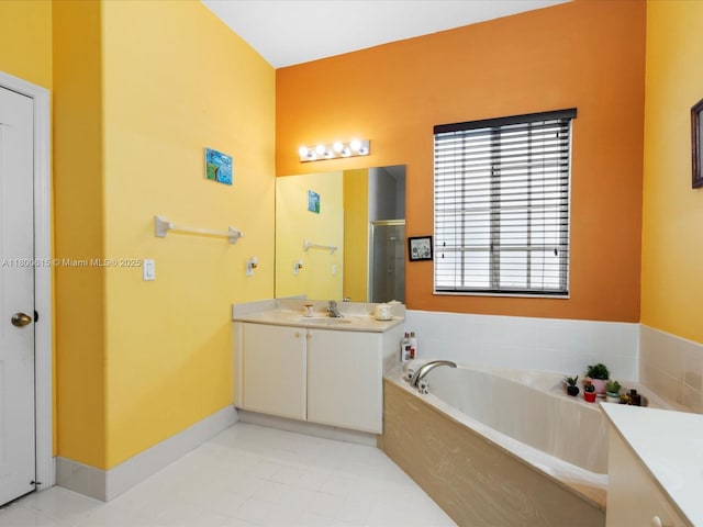 17616 SW 135th Ave, Miami, FL 33177 - bathroom with a shower stall, vanity, a garden tub, and tile patterned floors