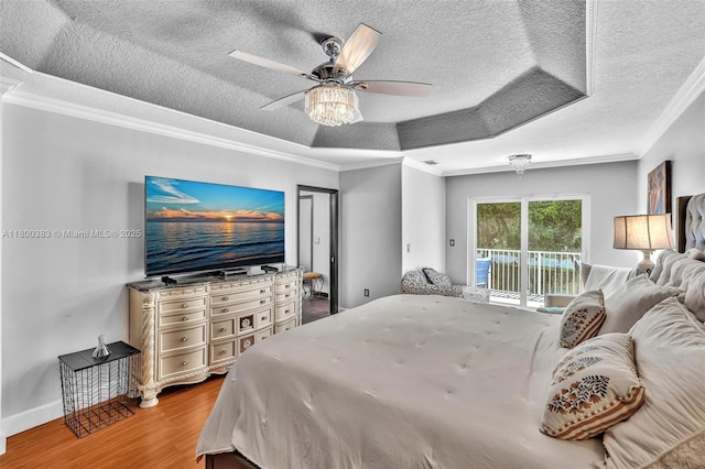 1811 SW 162nd Ave, Miramar, FL 33027 - bedroom featuring access to outside, wood finished floors, crown molding, a textured ceiling, and a ceiling fan