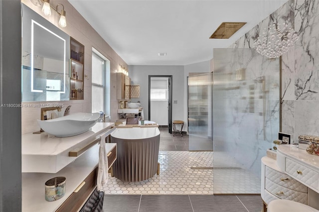 1811 SW 162nd Ave, Miramar, FL 33027 - full bath with two vanities, walk in shower, and tile patterned floors