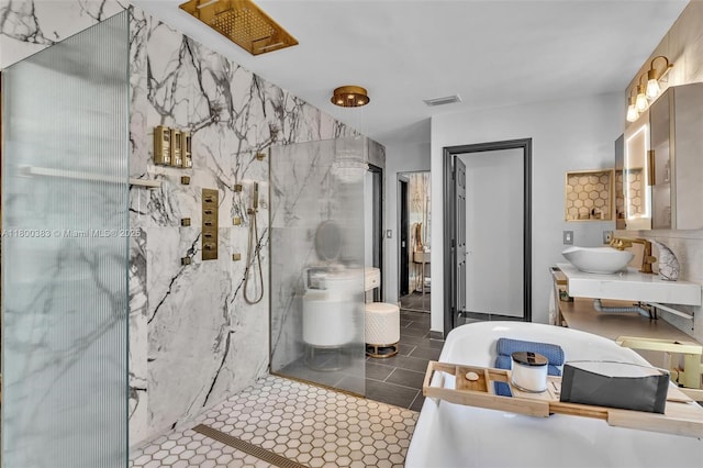 1811 SW 162nd Ave, Miramar, FL 33027 - bathroom featuring a soaking tub, a marble finish shower, vanity, tile patterned flooring, and tile walls