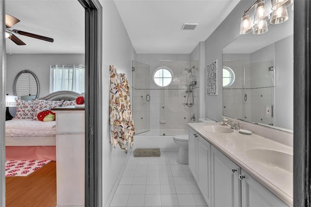 1811 SW 162nd Ave, Miramar, FL 33027 - bathroom with ensuite bathroom, a ceiling fan, combined bath / shower with glass door, double vanity, and tile patterned floors