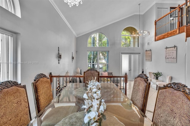 1811 SW 162nd Ave, Miramar, FL 33027 - tiled dining space featuring a chandelier, high vaulted ceiling, and ornamental molding