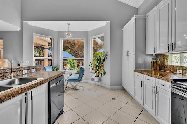 1811 SW 162nd Ave, Miramar, FL 33027 - kitchen with stainless steel appliances, white cabinets, ornamental molding, decorative backsplash, and decorative light fixtures