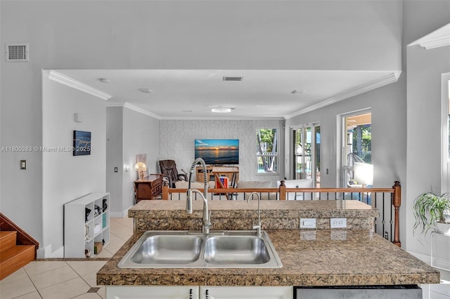 1811 SW 162nd Ave, Miramar, FL 33027 - kitchen with crown molding, tile countertops, light tile patterned floors, open floor plan, and an island with sink