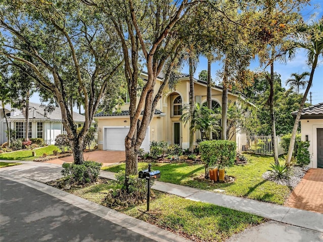 1811 SW 162nd Ave, Miramar, FL 33027 - view of front of house with stucco siding, decorative driveway, a tiled roof, and a garage