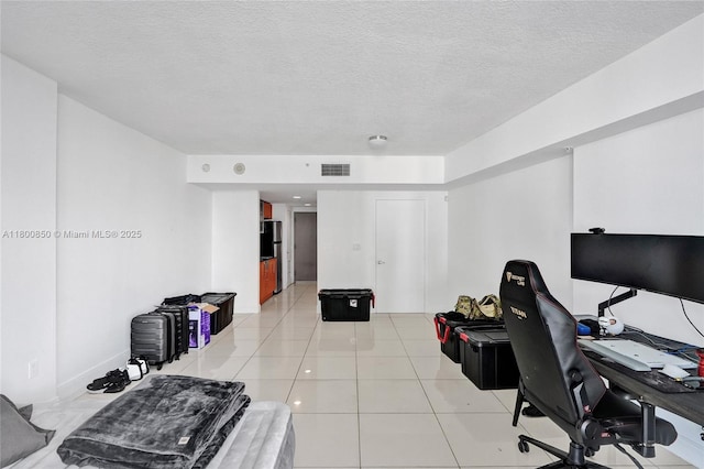 1750 N Bayshore Dr Unit 4007, Miami, FL 33132 - office area with a textured ceiling and light tile patterned floors