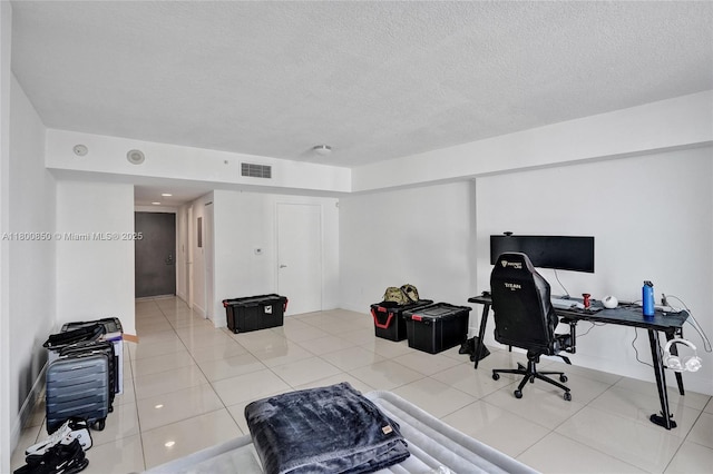 1750 N Bayshore Dr Unit 4007, Miami, FL 33132 - office space featuring a textured ceiling, light tile patterned flooring, and baseboards