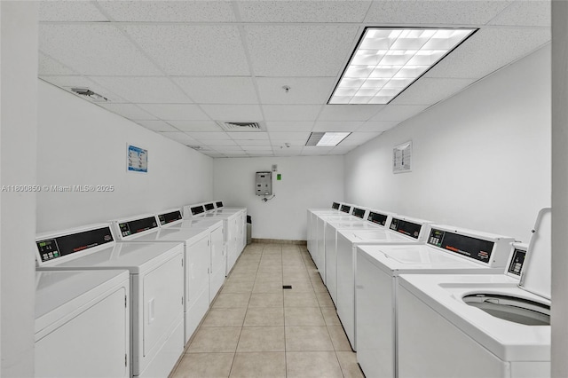 1750 N Bayshore Dr Unit 4007, Miami, FL 33132 - community laundry featuring washer and dryer and light tile patterned floors