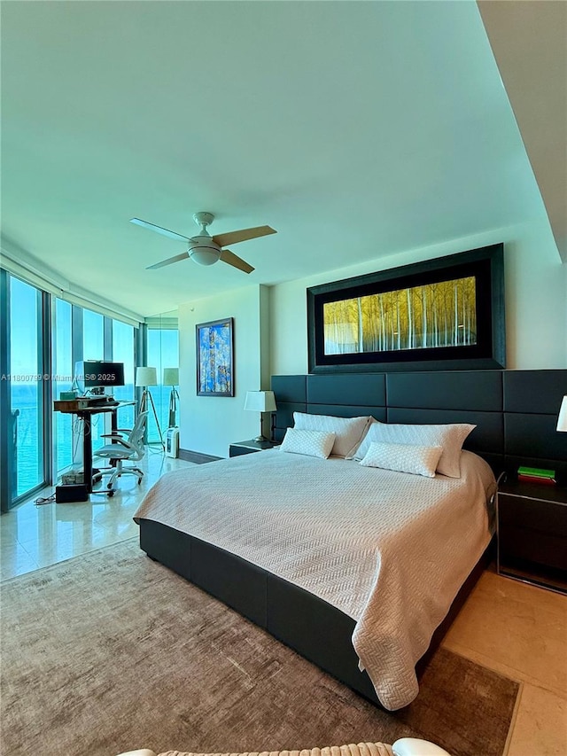 17001 Collins Ave Unit 3005, Sunny Isles Beach, FL 33160 - bedroom featuring floor to ceiling windows and a ceiling fan