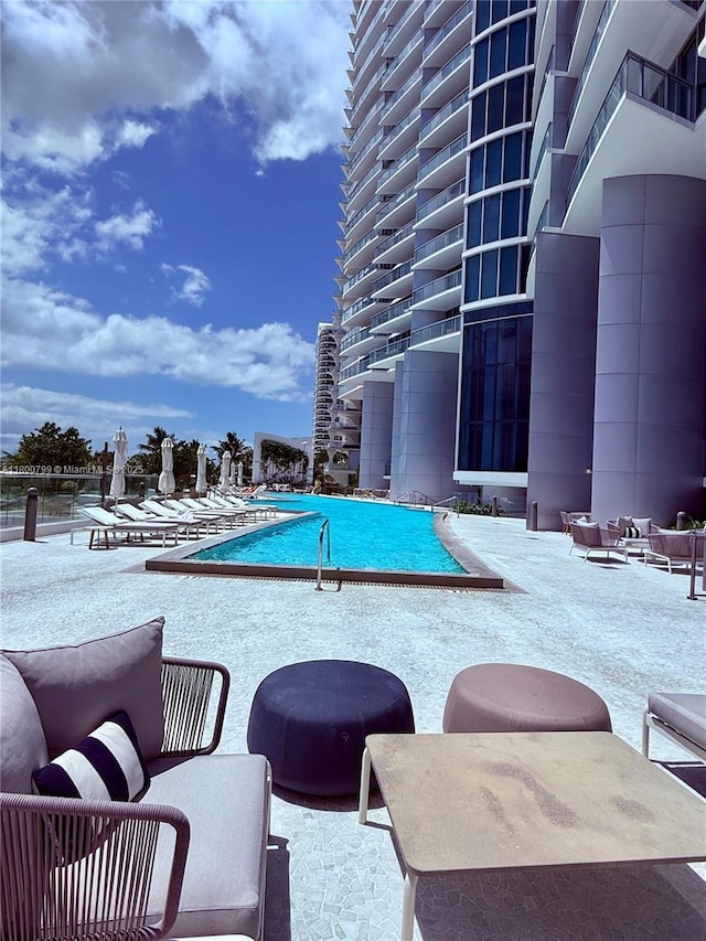 17001 Collins Ave Unit 3005, Sunny Isles Beach, FL 33160 - community pool featuring a patio