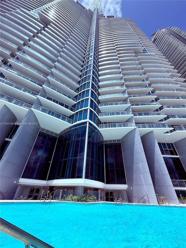 17001 Collins Ave Unit 3005, Sunny Isles Beach, FL 33160 - view of building exterior with a community pool
