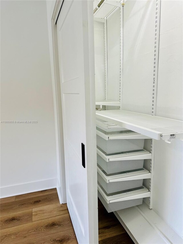 10361 NE 4th Ave, Miami Shores, FL 33138 - walk in closet with wood finished floors