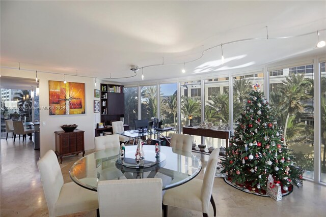 dining space featuring concrete flooring