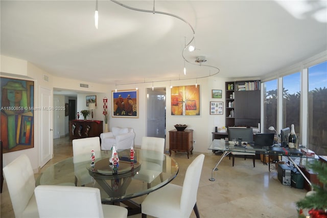 dining space with a desk