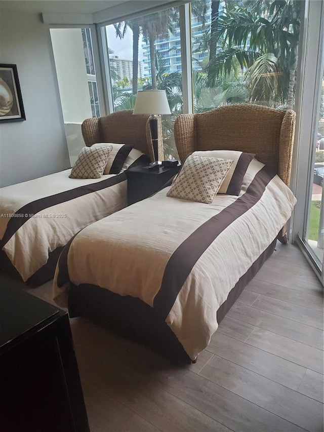 bedroom with wood finished floors