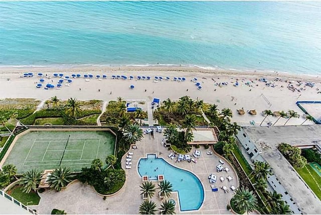 drone / aerial view of waterfront with a beach