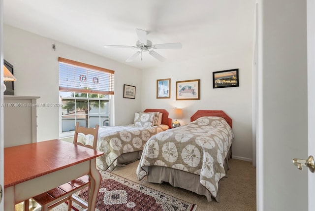 6893 Sterling Grns Unit 201, Naples, FL 34104 - bedroom with carpet flooring, ceiling fan, and baseboards