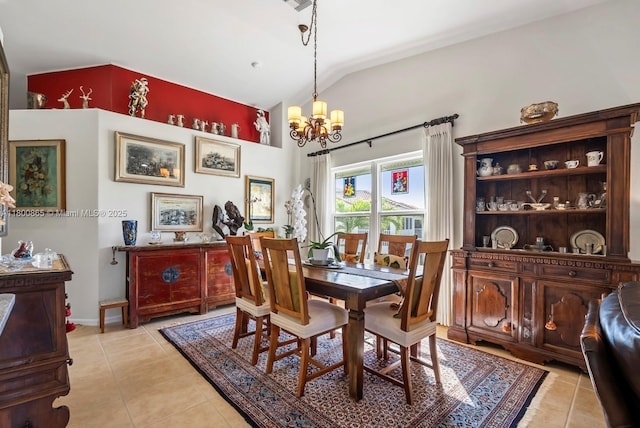 6893 Sterling Grns Unit 201, Naples, FL 34104 - dining space with a chandelier, light tile patterned floors, baseboards, and high vaulted ceiling